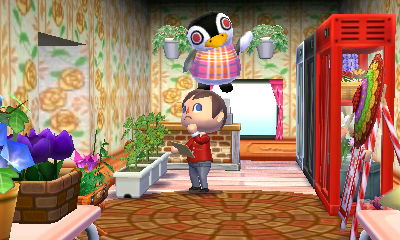 Aurora hovering in the air inside her flower shop in Animal Crossing: Happy Home Designer.