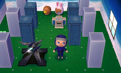 A recreation of a Star Fox game with an Arwing and dressers as buildings in the dream town of Titania.
