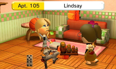 Lindsay and Squishy throw items at each other during a fight.