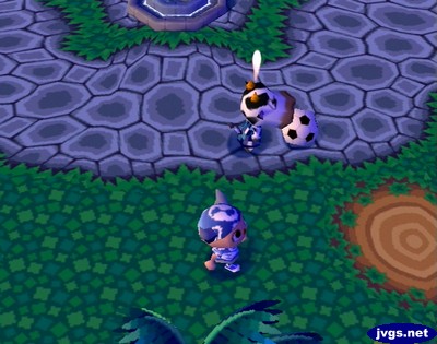 An angry Belle kicks around a soccer ball near the wishing well plaza.