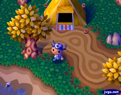 A summer camper's tent near the beach.