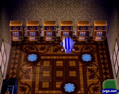 A bunch of slot machines lined up in Anchovy's house.