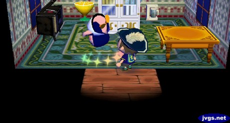 Friga flips as she takes her medicine.