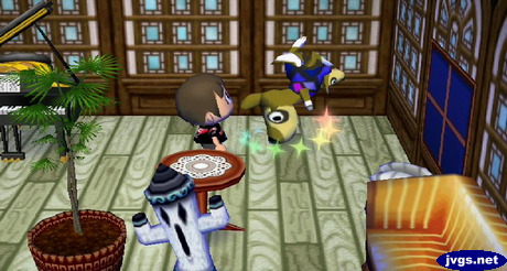 Kitt flips upside-down as she takes her medicine.