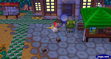 Firing a party popper while standing next to Nat, the Bug-Off judge.