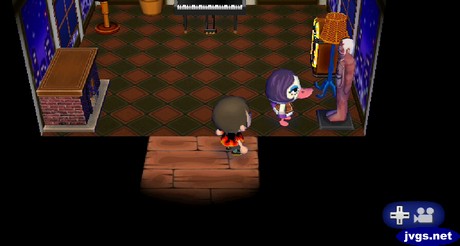 Gloria stares intently at her anatomical model.