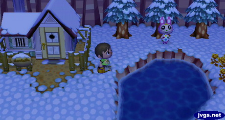 Chrissy standing by the pond. Is she thinking about jumping in?