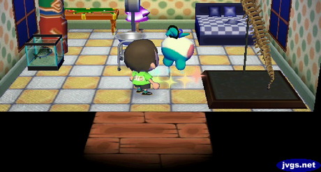 An upside-down Lily takes some medicine for a cold.