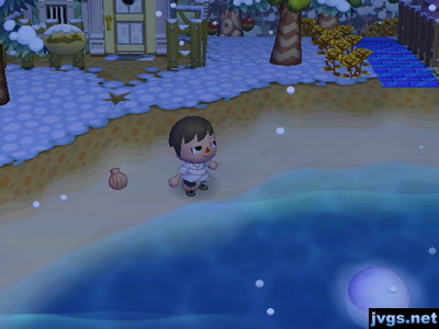 Pushing a large snowball into the ocean.