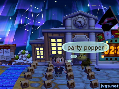 Around 20 party poppers on the ground near Tortimer and the countdown clock.