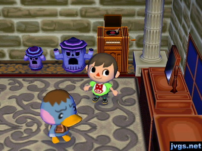 Two gyroids in Pate's house. One looks scared, while the other looks scary.