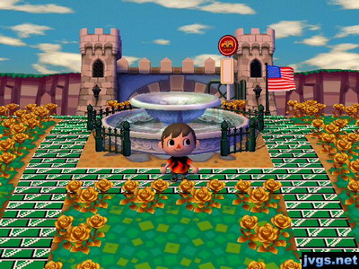 Me standing by my town fountain on a sunny day in Forest.