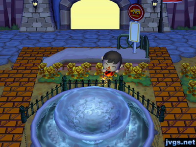 Me burning off a sparkler near the town fountain.