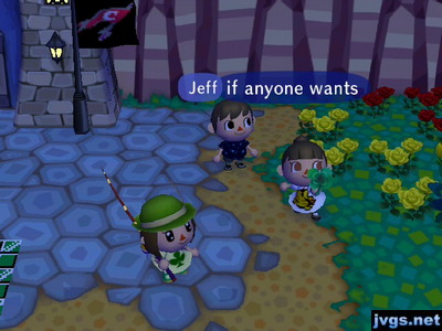 Wendy holds up a four-leaf clover she picked.