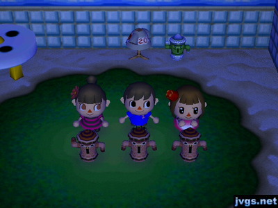 Wendy, Jeff, and Yann, standing behind tootoids.