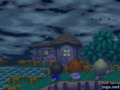 Jeff, Wendy, and Megan shooting their slingshots up at the clouds.