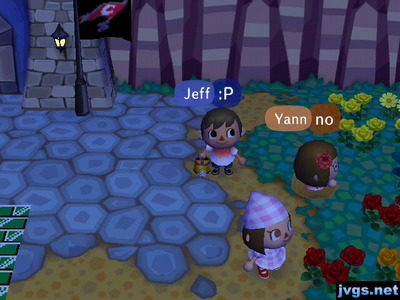 Yann struggles to get out of a pitfall as Jeff and Wendy stand nearby.