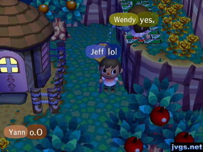 Wendy, standing on a cliff, sprinkles water from a watering can onto Jeff down below.
