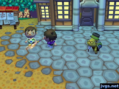 Jeff burning Jake with a roman candle outside of town hall.