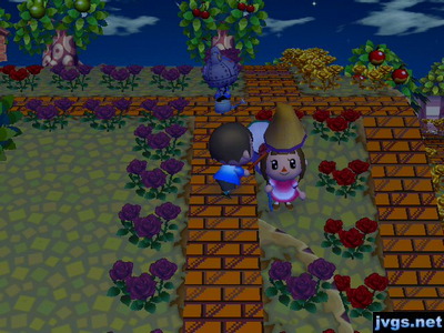 Me hitting Yann on the head with a net, so that it looks like she's wearing a tall hat.