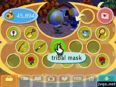 A tribal mask in my pockets.