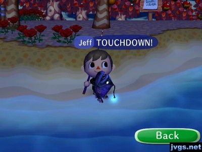 Jeff, holding a football fish: TOUCHDOWN!