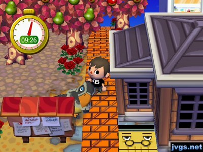 Avery peeks out from behind the bulletin board during a game of hide-and-seek.