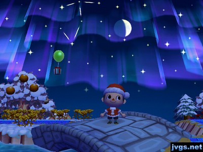 The northern lights up in the sky, as a balloon present floats by.