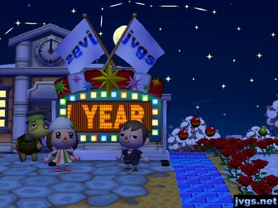 The clock strikes midnight and "HAPPY NEW YEAR" scrolls across the screen.