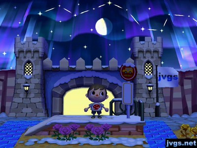 The northern lights in the sky, as seen above the castle style gate in Forest.