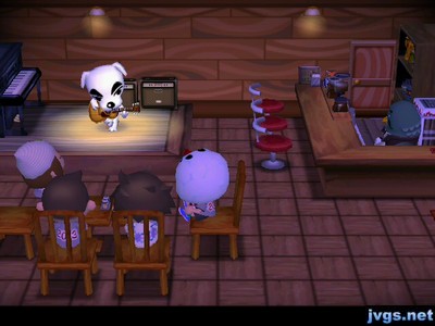 Yann, Taylor, Jake, and Jeff enjoy a performance from K.K. Slider.
