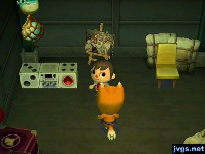 A dice stereo, a perfect painting, and a gold econo-chair on sale in Crazy Redd's shop.