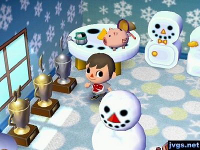 My bug and fish trophies on display in my snowman-themed house.
