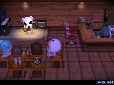 The four of us seated in the Roost, as K.K. prepares to sing a song for us.