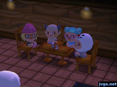 The four of us seated in the Roost, enjoying a musical performance from K.K. Slider.