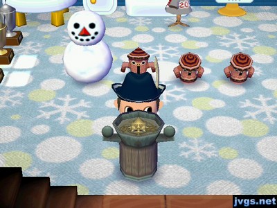 Jeff standing at the ship compass in a snowman-themed room.