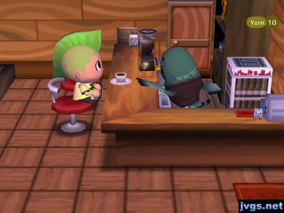 Brewster hands me a cup of coffee in the Roost.