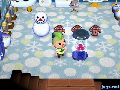 A Metroid on display in my snowman-themed house.