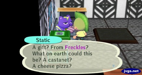 Static: A gift? From Freckles? What on earth could this be? A castanet? A cheese pizza?