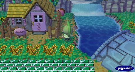 Freckles hides behind a house during a game of hide-and-seek in Animal Crossing: City Folk.