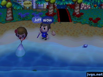 Yann holds her net in the water.