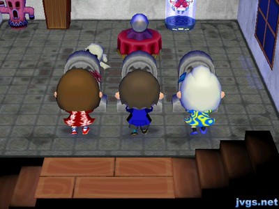 Yann, Jeff, and Megan standing in front of their graves.