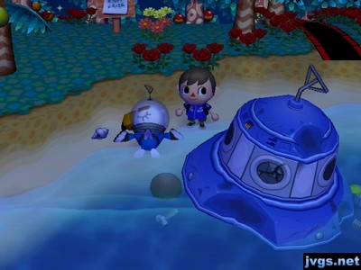The damaged UFO on the beach, with Gulliver lying next to it.