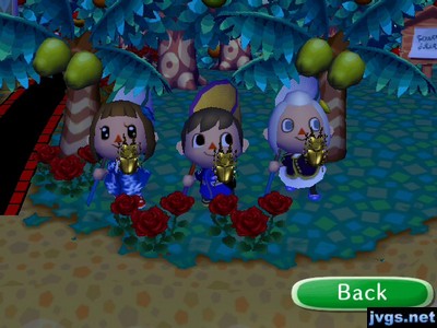 Yann, Jeff, and Megan all holding golden stags.