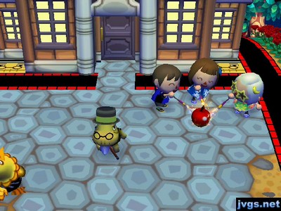 Jeff, Yann, and Megan cooking an apple with Roman candles.