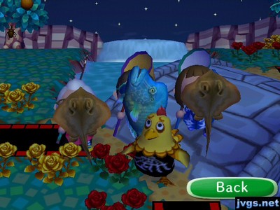 Egbert stands near us, as we show off our large fish catches.