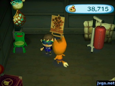 A froggy chair, a flowery painting, and a sandbag up for sale at Crazy Redd's shop.