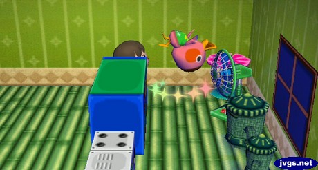 Freckles appears to hover upside-down in the air as she takes her medicine.