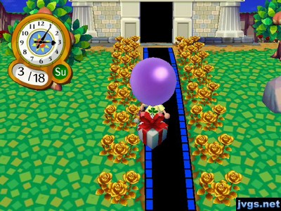 A purple balloon present flies over my head.