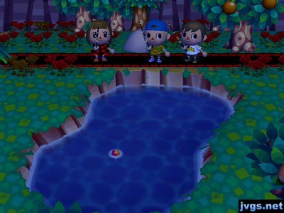 Yann, Jon, and Jeff fishing in a pond.